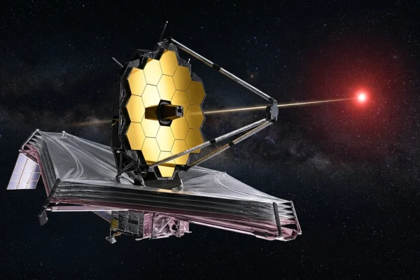 A massive array of radio telescope dishes pointing toward a glowing Milky Way galaxy.