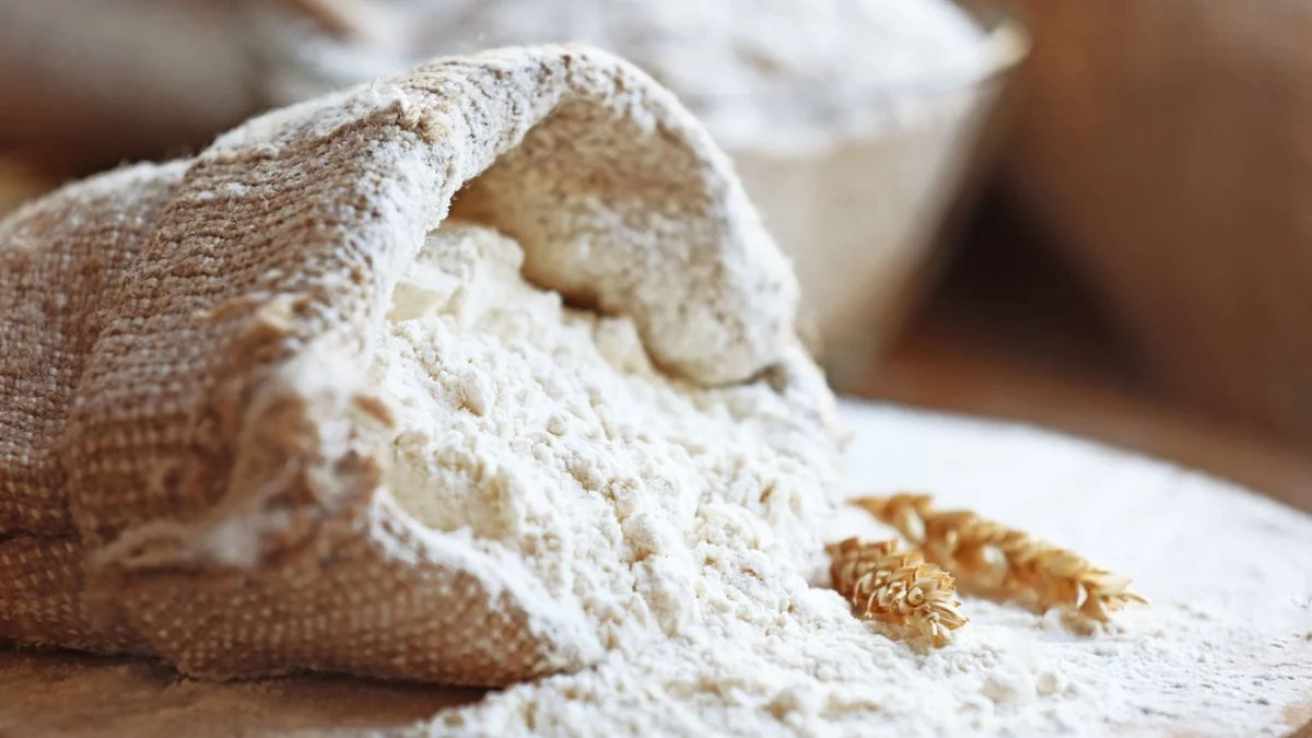 Flour in flour bag cascading onto worktop