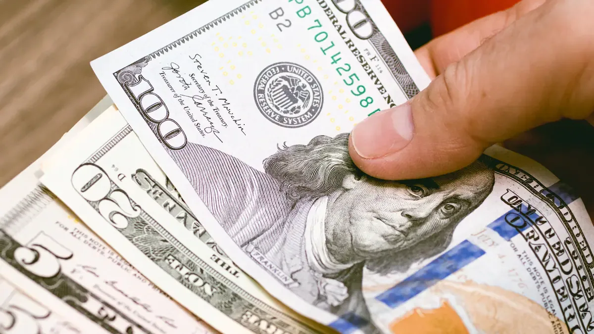 Money, US dollar. A woman counting dollar bills. Close up photo. Concept for economy and personal finance.