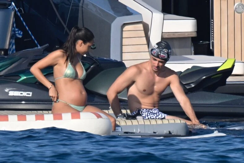 Charles Leclerc and wife Alexandra in their swimwear - her in a bikini, him in swim trunks - on a yacht on August 2, 2026