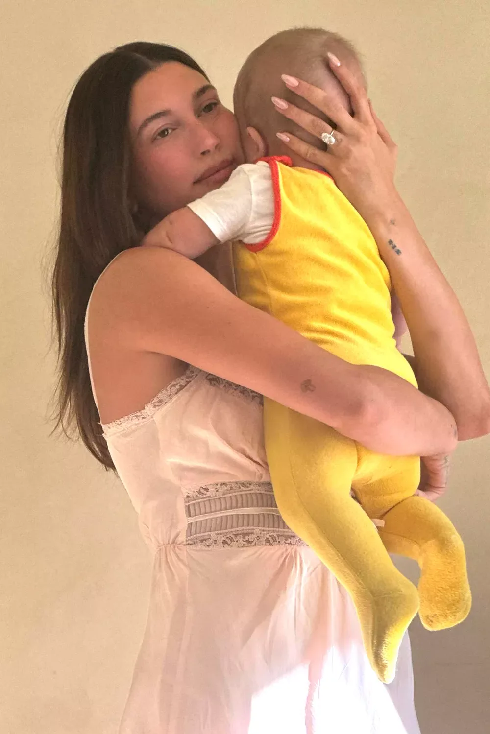 Hailey Bieber holds her son Jack Blues Bieber in April 2025.